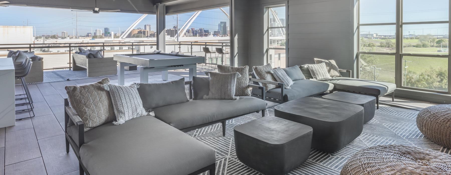 a living room with a large pool